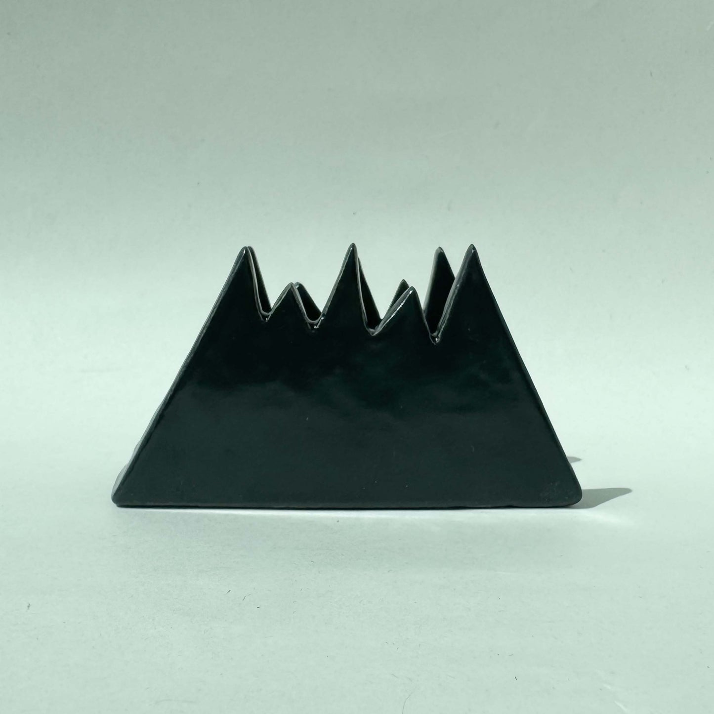 Servilletero con diseño de montaña