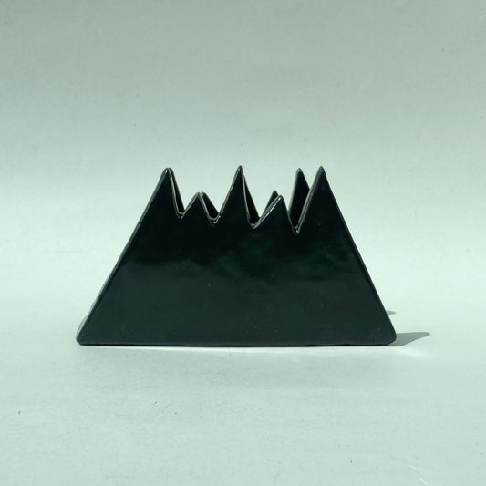 Servilletero con diseño de montaña