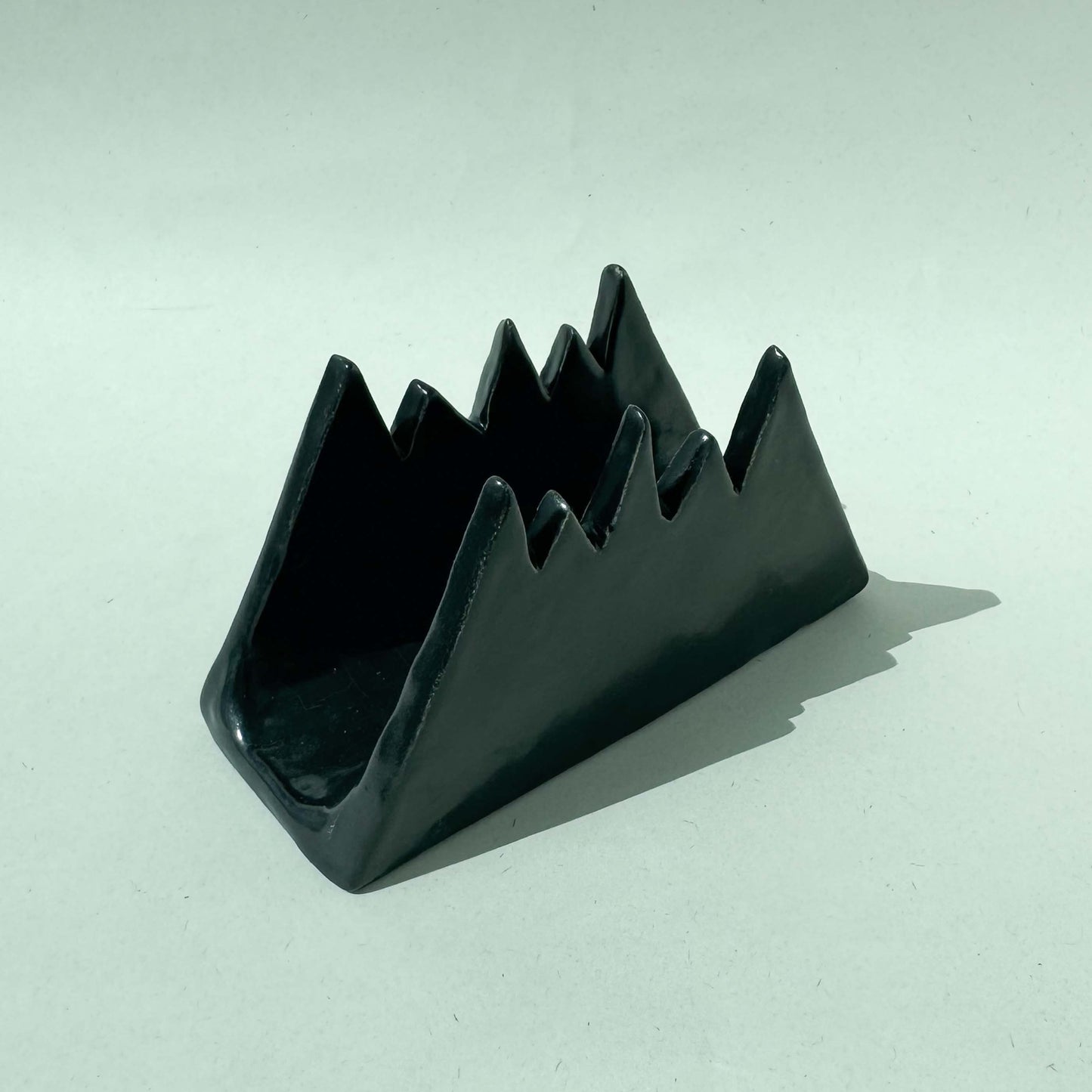 Servilletero con diseño de montaña