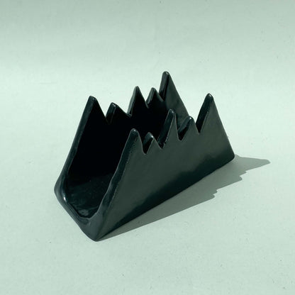 Servilletero con diseño de montaña