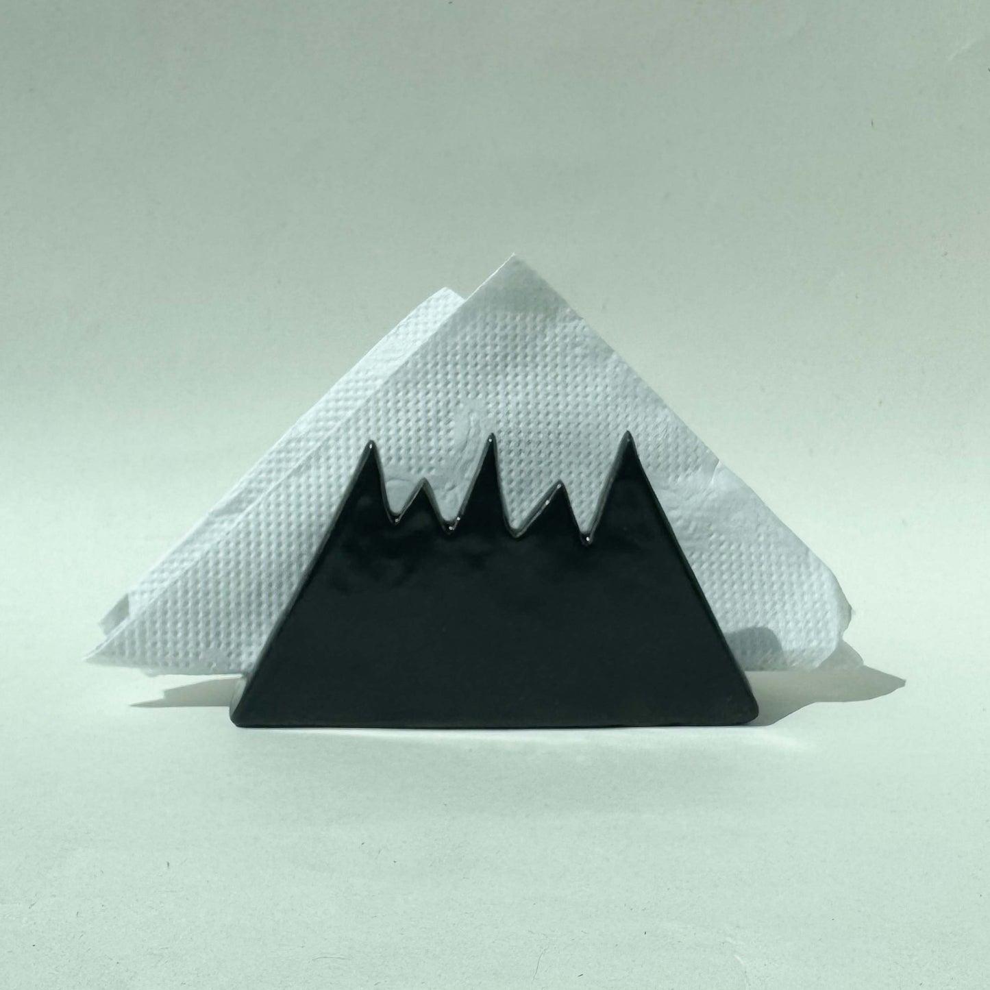 Servilletero con diseño de montaña