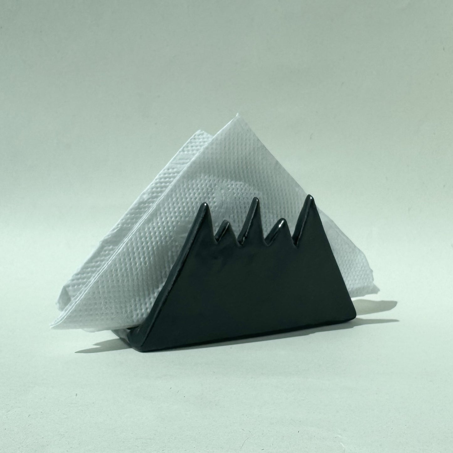 Servilletero con diseño de montaña